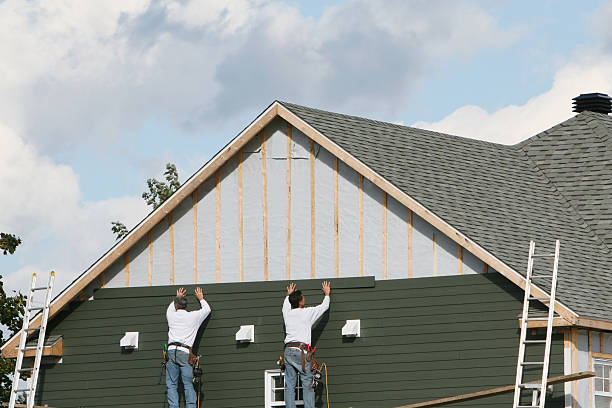Professional Siding Installation technician working in Arlington Heights, WA
